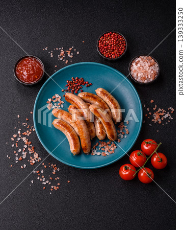 Grilled or barbecued chicken sausages for the dinner table. Grilled sausages 139333250
