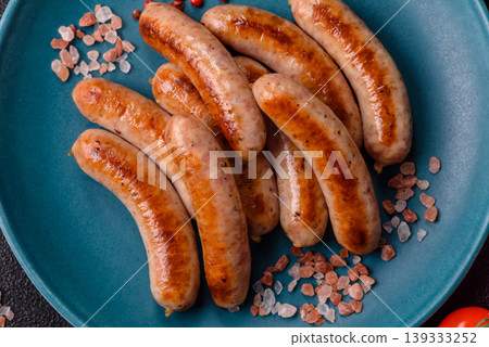 Grilled or barbecued chicken sausages for the dinner table. Grilled sausages 139333252