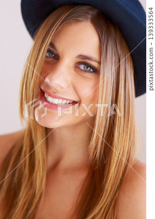 Hipster, hat and portrait of happy woman with vintage, fashion and confidence in white background or studio. Retro, style and face of person in old fashioned fedora with makeup, cosmetics and beauty 139333564