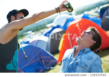 Beer, festival or drunk friends drinking together, alcohol beverage or outdoor social event. Summer music concert, pouring drinks or excited people with freedom, can or party games in celebration Beer, festival or drunk friends drinking together, alcohol beverage or outdoor social event. Summer music concert, pouring drinks or excited people with freedom, can or party games in celebration 139333591