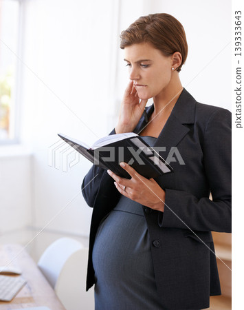 Business woman, pregnant and thinking with diary for schedule, planner or agenda at office. Female person or employee in wonder, maternity or pregnancy with notebook for calendar, plan or reminder 139333643