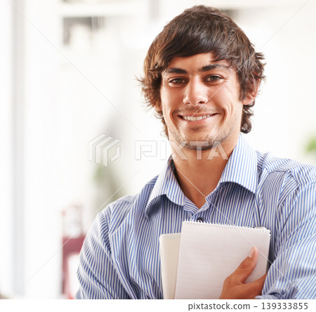 Businessman, portrait and happy with notebook in office, confident and career pride for startup. Entrepreneur, smile or face of creative writer for job ambition, planning or relax wellness in company Businessman, portrait and happy with notebook in office, confident and career pride for startup. Entrepreneur, smile or face of creative writer for job ambition, planning or relax wellness in company 139333855
