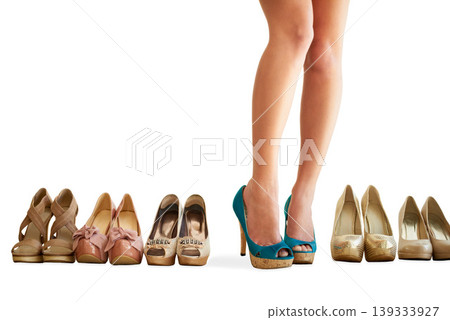 Woman, shoes and legs in studio with choice, decision or getting ready for work with mock up space. Person, feet and high heels for fashion, corporate career or choosing footwear on white background Woman, shoes and legs in studio with choice, decision or getting ready for work with mock up space. Person, feet and high heels for fashion, corporate career or choosing footwear on white background 139333927