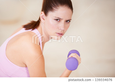 Woman, portrait and dumbbell gym exercise for routine, active performance for strength practice. Female person, face and weights for health wellness or challenge muscle, strong or workout training Woman, portrait and dumbbell gym exercise for routine, active performance for strength practice. Female person, face and weights for health wellness or challenge muscle, strong or workout training 139334076