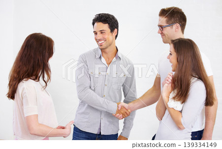 Happy business people, handshake and introduction for teamwork, success and b2b agreement, acquisition deal or praise. Employees shaking hands for partnership, collaboration and welcome to onboarding 139334149