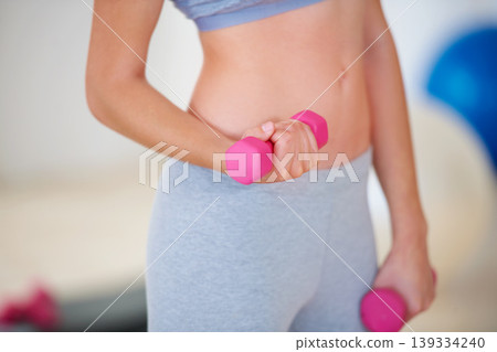 Weights, workout and hands of woman for fitness, bodybuilder training and exercise to lose weight. Sports club, weightlifting and closeup of person with dumbbells for wellness, health or strength Weights, workout and hands of woman for fitness, bodybuilder training and exercise to lose weight. Sports club, weightlifting and closeup of person with dumbbells for wellness, health or strength 139334240
