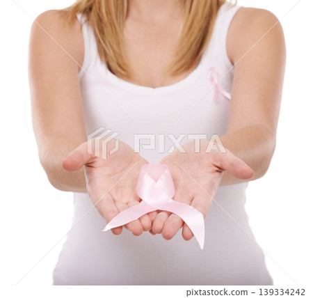 Woman, hands and pink ribbon for breast cancer, support or awareness against a white studio background. Closeup of female person or blonde with symbol, bow or band for voice, start or launch campaign Woman, hands and pink ribbon for breast cancer, support or awareness against a white studio background. Closeup of female person or blonde with symbol, bow or band for voice, start or launch campaign 139334242