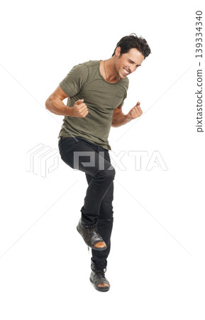 Man, happy and jumping for celebration, smile and energy by white background in studio. Male person, freedom and victory or winner, carefree and ecstatic for achievement in competition or excited Man, happy and jumping for celebration, smile and energy by white background in studio. Male person, freedom and victory or winner, carefree and ecstatic for achievement in competition or excited 139334340