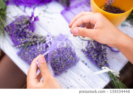 Making sachets of lavender. Small bag to scent clothes to put it in wardrobe. Harvest of lavender 139334448