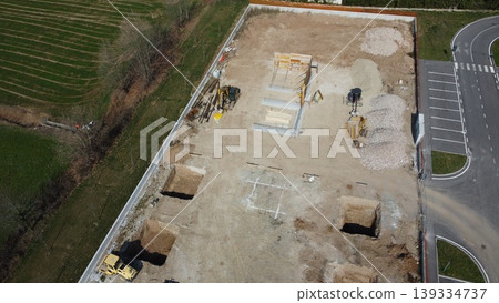 Aerial view of a construction site for a new industrial building Aerial view of a construction site for a new industrial building 139334737