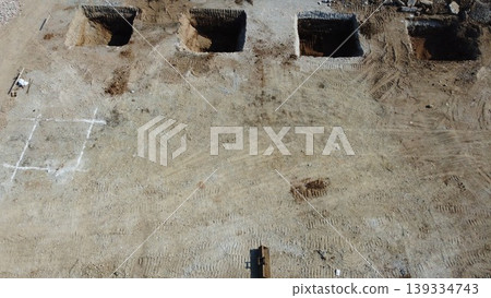 Aerial view of a construction site for a new industrial building Aerial view of a construction site for a new industrial building 139334743
