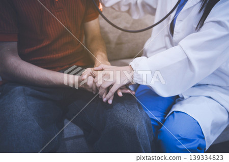 Doctor using a stethoscope checking patient with examining, presenting results symptom and recommend treatment method, Healthcare and medical concept Doctor using a stethoscope checking patient with examining, presenting results symptom and recommend treatment method, Healthcare and medical concept 139334823