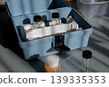 Portable water testing kit with sample vials and container 139335353