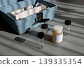 Portable water testing kit with sample vials and container 139335354