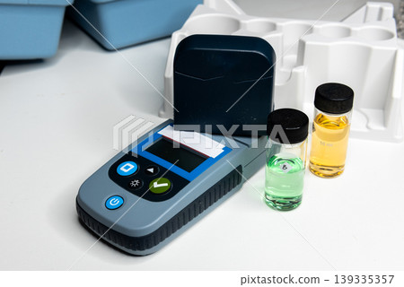 Portable water testing kit with sample vials and container Portable water testing kit with sample vials and container 139335357