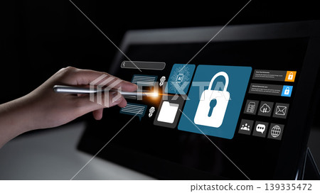 Hand Using Stylus on Digital Screen Displaying Cybersecurity Icons and Lock Symbol for Secure Data Protection and Information Privacy Management Gantry Hand Using Stylus on Digital Screen Displaying Cybersecurity Icons and Lock Symbol for Secure Data Protection and Information Privacy Management Gantry 139335472