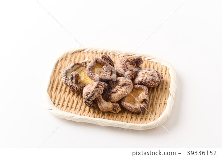 Dried shiitake mushrooms served in a colander Dried shiitake mushrooms served in a colander 139336152