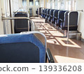 The narrow interior of a local train 139336208