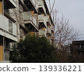 Dilapidated apartment building 139336221