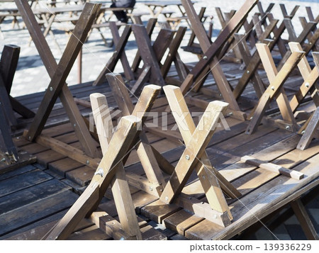 Wooden chairs put away 139336229
