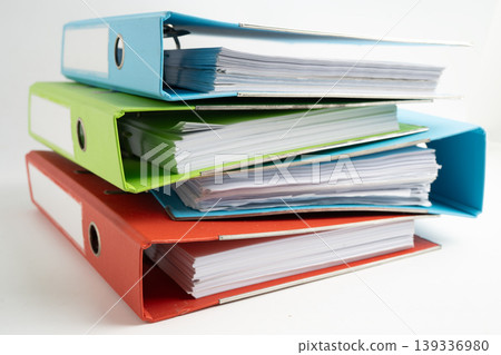 Stack of business finance data finder on white background. 139336980