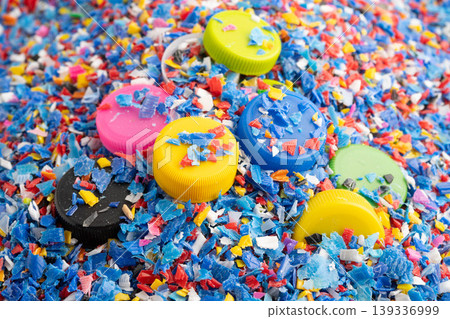 Bangkok, Thailand April 20, 2024 Plastic recycle pellets and caps for industrial use. Bangkok, Thailand April 20, 2024 Plastic recycle pellets and caps for industrial use. 139336999