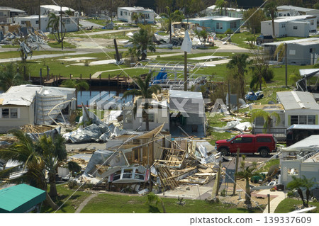 Aerial view of heavily damaged by hurricane Ian houses in Florida mobile home residential area. Consequences of natural disaster Aerial view of heavily damaged by hurricane Ian houses in Florida mobile home residential area. Consequences of natural disaster 139337609