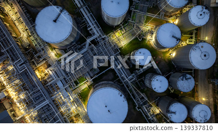 Aerial view oil storage tank and pipeline steel at night, Oil tank storage chemical petroleum petrochemical refinery product, Oil transportation system pipeline steel at oil refinery industry 139337810