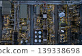 Aerial view Oil and Gas refinery industrial at night, Oil and Gas refinery plant form industry, Refinery plant factory white oil storage tank at night, Oil and Gas refinery plant from industry zone. 139338698