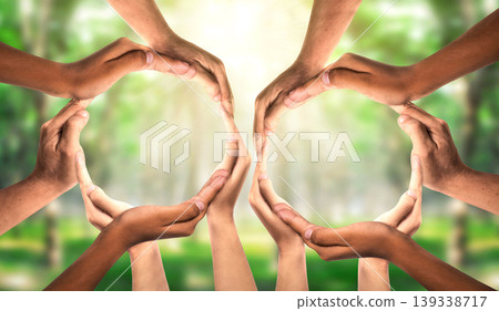 Symbol and shape of circle created from hands. Group Unity and diversity partnership as hands connected together as two teams in support as a symbol of connected teamwork and togetherness. Symbol and shape of circle created from hands. Group Unity and diversity partnership as hands connected together as two teams in support as a symbol of connected teamwork and togetherness. 139338717