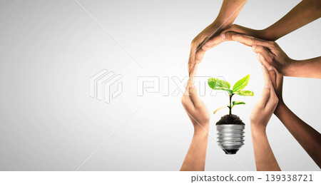 Bulbs with seedling on soil. Earth day and earth day as group of diverse people joining to form hands connected together protecting the environment and promoting conservation and climate change issues Bulbs with seedling on soil. Earth day and earth day as group of diverse people joining to form hands connected together protecting the environment and promoting conservation and climate change issues 139338721