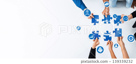 Collaborative Hands Assembling Puzzle Pieces to Symbolize Teamwork, Creativity, and Innovative Solutions for Business Development. Amity Collaborative Hands Assembling Puzzle Pieces to Symbolize Teamwork, Creativity, and Innovative Solutions for Business Development. Amity 139339232