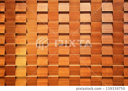 Decorative Geometric Wooden Wall Panel with Repeating Pattern of Angled Blocks. 139339750