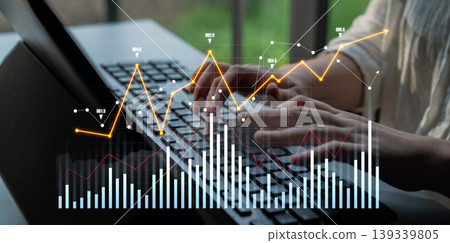 Rising Trends in Data Analysis with Charts and Graphs on a Laptop Keyboard in an Office Setting Scalp Rising Trends in Data Analysis with Charts and Graphs on a Laptop Keyboard in an Office Setting Scalp 139339805