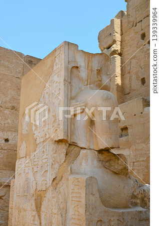 Luxor Temple: A rear view of the statues of King Tutankhamun and Queen Ankhesenamun. Luxor Temple: A rear view of the statues of King Tutankhamun and Queen Ankhesenamun. 139339964