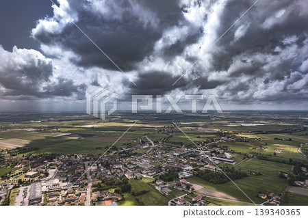 Aerial View of Stormy Clouds Over a Northern Italian Village Aerial View of Stormy Clouds Over a Northern Italian Village 139340365