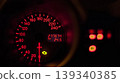 Car speedometer showing kilometers per hour and total kilometers driven at night 139340385