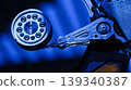 Close-up of hard disk drive reading data with blue light 139340387