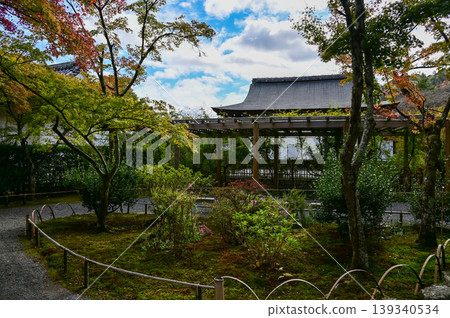 The garden scene of Tenryuji Temple at autumn. Famous temple in Japan. Tenryuji Temple is a Japanese traditional temples in Kyoto. Autumn and garden view. Nature and Travel concept. The garden scene of Tenryuji Temple at autumn. Famous temple in Japan. Tenryuji Temple is a Japanese traditional temples in Kyoto. Autumn and garden view. Nature and Travel concept. 139340534