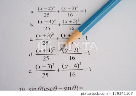 Pencil on mathematic formula exercise test paper in education school. Pencil on mathematic formula exercise test paper in education school. 139341167