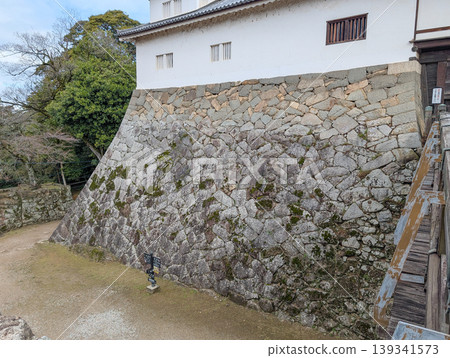 Stone wall on the west side of the Tenbin-yagura tower within Hikone Castle in Hikone City, Shiga Prefecture Stone wall on the west side of the Tenbin-yagura tower within Hikone Castle in Hikone City, Shiga Prefecture 139341573