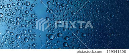 Water droplets attached to the glass Water droplets attached to the glass 139341808