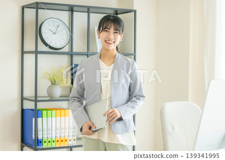 Young business woman in the office Young business woman in the office 139341995