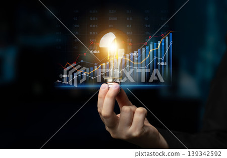Innovative Business Concept with Light Bulb Idea and Financial Growth Graphs Depicting Progress in Modern Economy and Investment Strategies Scalp Innovative Business Concept with Light Bulb Idea and Financial Growth Graphs Depicting Progress in Modern Economy and Investment Strategies Scalp 139342592