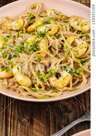 Creamy shrimp pasta with spaghetti and herbs Creamy shrimp pasta with spaghetti and herbs 139343169