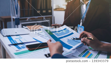 Accounting company provide finance and taxation planning for profitable cash flow, Auditor and accountant team working in office, analyze financial data and accounting record with calculator 139343379
