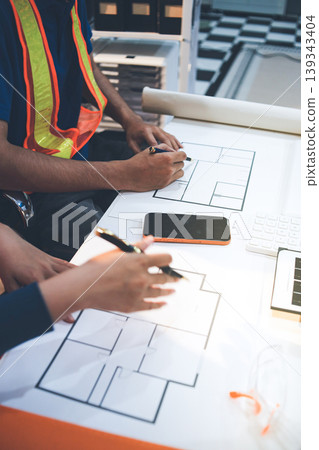 Concept Architect and desk of Architectural project in construction site or office building with mining light Concept Architect and desk of Architectural project in construction site or office building with mining light 139343404