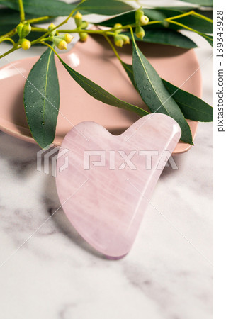 Rose quartz gua sha, abstract beauty photo 139343928