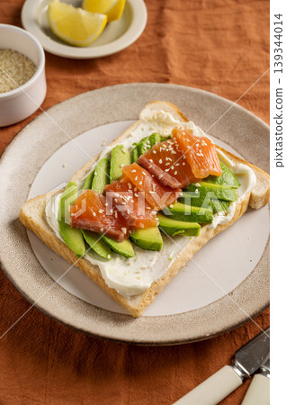 Salmon toast with avocado and cream cheese, breakfast, healthy food Salmon toast with avocado and cream cheese, breakfast, healthy food 139344014