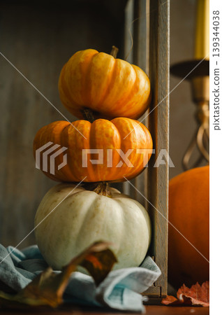 Orange and white pumpkins, rustic wooden moody background, autumn concept 139344038